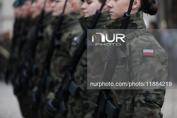 Polish Army soldiers are seen on the Main Square in Krakow, Poland, on November 24, 2024. 