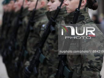 Polish Army soldiers are seen on the Main Square in Krakow, Poland, on November 24, 2024. (