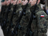 Polish Army soldiers are seen on the Main Square in Krakow, Poland, on November 24, 2024. (