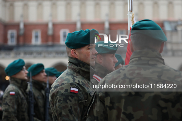 Polish Army soldiers are seen on the Main Square in Krakow, Poland, on November 24, 2024. 