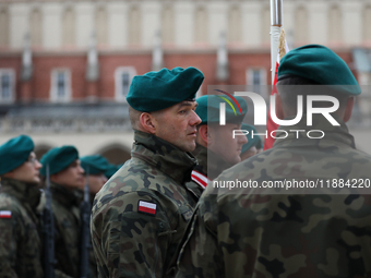 Polish Army soldiers are seen on the Main Square in Krakow, Poland, on November 24, 2024. (