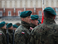 Polish Army soldiers are seen on the Main Square in Krakow, Poland, on November 24, 2024. (