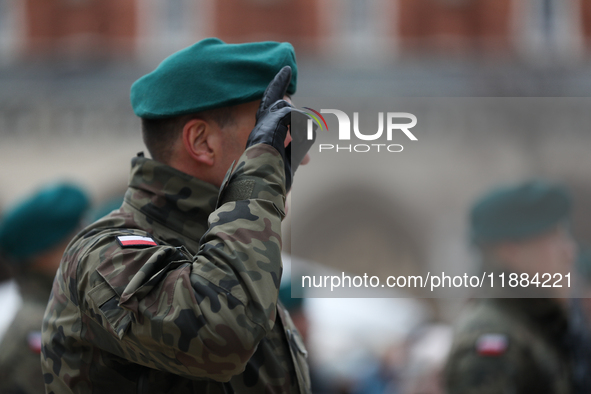 Polish Army soldiers are seen on the Main Square in Krakow, Poland, on November 24, 2024. 