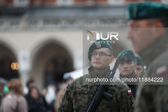 Polish Army soldiers are seen on the Main Square in Krakow, Poland, on November 24, 2024. 