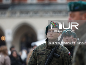 Polish Army soldiers are seen on the Main Square in Krakow, Poland, on November 24, 2024. (