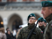 Polish Army soldiers are seen on the Main Square in Krakow, Poland, on November 24, 2024. (