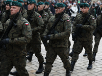 Polish Army soldiers are seen on the Main Square in Krakow, Poland, on November 24, 2024. (