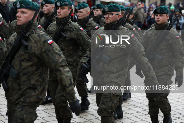 Polish Army soldiers are seen on the Main Square in Krakow, Poland, on November 24, 2024. 