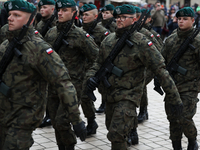 Polish Army soldiers are seen on the Main Square in Krakow, Poland, on November 24, 2024. (