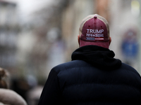 A man wears a cap with the words 'Trump 2024 the sequel' on the street in Krakow, Poland, on November 24, 2024. (