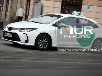 A Bolt car is seen on the street in Krakow, Poland, on November 24, 2024. (