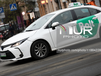 A Bolt car is seen on the street in Krakow, Poland, on November 24, 2024. (