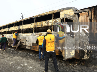 Burnt debris of vehicles is at the site of the accident after a tanker loaded with LPG collides with some other vehicles and catches fire on...