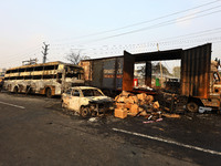 Burnt debris of vehicles is at the site of the accident after a tanker loaded with LPG collides with some other vehicles and catches fire on...