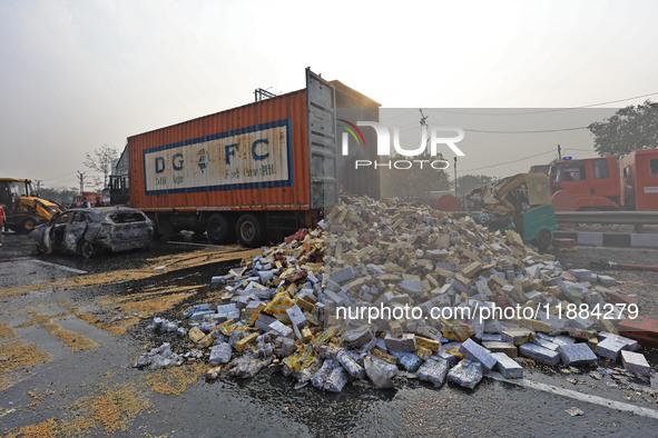 Burnt debris of vehicles is at the site of the accident after a tanker loaded with LPG collides with some other vehicles and catches fire on...