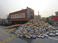 Burnt debris of vehicles is at the site of the accident after a tanker loaded with LPG collides with some other vehicles and catches fire on...