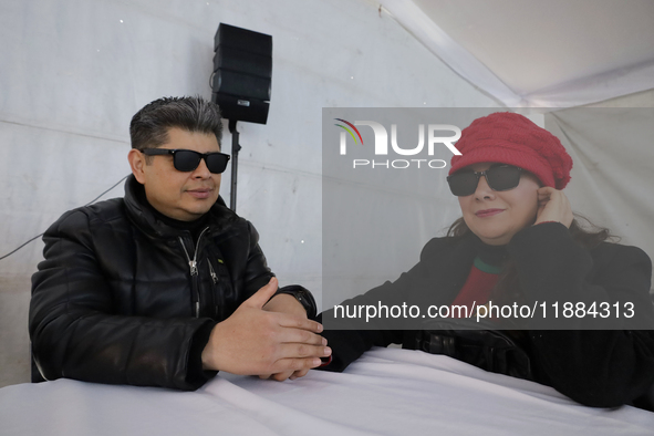 Blind people attend a meeting at the Guide Dog Training School for the Blind (I.A.P) in Mexico City, Mexico, on December 20, 2024. The schoo...