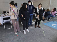 Blind people attend a meeting at the Guide Dog Training School for the Blind (I.A.P) in Mexico City, Mexico, on December 20, 2024. The schoo...