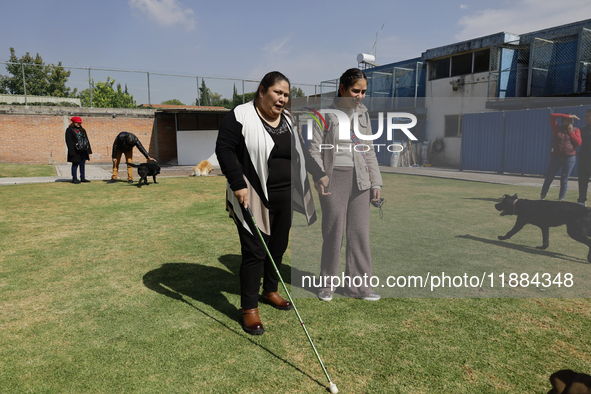 Blind women attend a meeting at the Guide Dogs for the Blind Training School I.A.P in Mexico City, Mexico. The school provides inclusive reh...