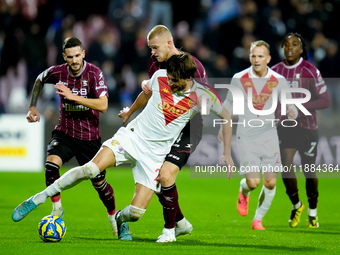 Gennaro Borrelli of Brescia Calcio and Tijs Velthuis of US Salernitana compete for the ball during the Serie BKT match between US Salernitan...