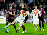 Gennaro Borrelli of Brescia Calcio and Tijs Velthuis of US Salernitana compete for the ball during the Serie BKT match between US Salernitan...