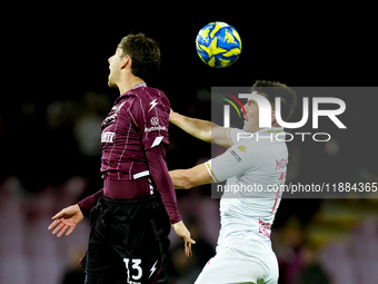 Fabio Ruggeri of US Salernitana and Gabriele Moncini of Brescia Calcio jump for the ball during the Serie BKT match between US Salernitana a...