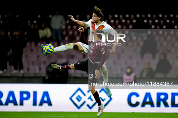 Gennaro Borrelli of Brescia Calcio and Fabio Ruggeri of US Salernitana jump for the balduring the Serie BKT match between US Salernitana and...