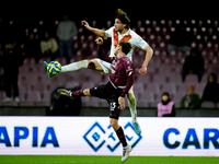 Gennaro Borrelli of Brescia Calcio and Fabio Ruggeri of US Salernitana jump for the balduring the Serie BKT match between US Salernitana and...