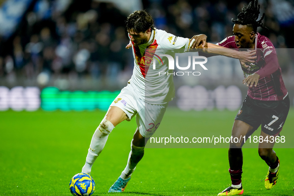 Gennaro Borrelli of Brescia Calcio and Franco Tongya of US Salernitana compete for the ball during the Serie BKT match between US Salernitan...