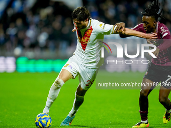 Gennaro Borrelli of Brescia Calcio and Franco Tongya of US Salernitana compete for the ball during the Serie BKT match between US Salernitan...