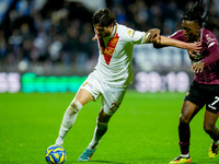 Gennaro Borrelli of Brescia Calcio and Franco Tongya of US Salernitana compete for the ball during the Serie BKT match between US Salernitan...