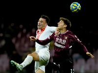 Gabriele Moncini of Brescia Calcio and Fabio Ruggeri of US Salernitana jump for the ball during the Serie BKT match between US Salernitana a...