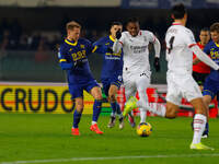 AC Milan's Rafael Leao plays against Hellas Verona's Reda Belahyane during the Italian Serie A Enilive soccer championship match between Hel...