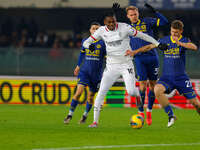 AC Milan's Rafael Leao plays against Hellas Verona's Reda Belahyane during the Italian Serie A Enilive soccer championship match between Hel...