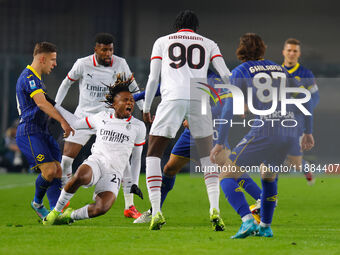 AC Milan's Samuel Chukwueze plays against Hellas Verona's Tomas Suslov during the Italian Serie A Enilive soccer championship match between...