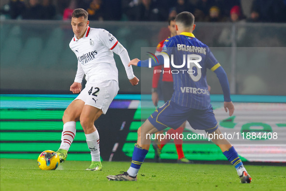 AC Milan's Filippo Terracciano plays against Hellas Verona's Reda Belahyane during the Italian Serie A Enilive soccer championship football...