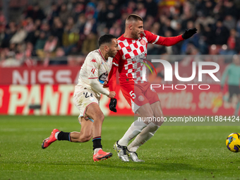 Players are in action during the LaLiga EA Sports 2024-2025 match between Girona FC and Real Valladolid at Montilivi Stadium in Girona, Spai...