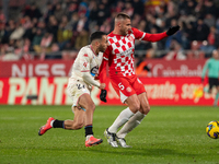 Players are in action during the LaLiga EA Sports 2024-2025 match between Girona FC and Real Valladolid at Montilivi Stadium in Girona, Spai...