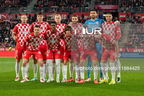 In Girona, Spain, on December 20, 2024, Girona FC players form during the LaLiga EA Sports 2024-2025 match between Girona FC and Real Vallad...