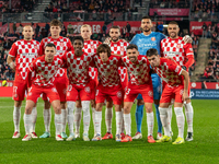 In Girona, Spain, on December 20, 2024, Girona FC players form during the LaLiga EA Sports 2024-2025 match between Girona FC and Real Vallad...