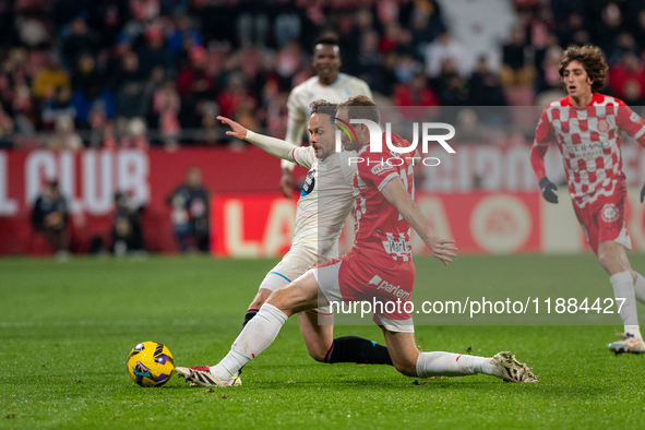 Players are in action during the LaLiga EA Sports 2024-2025 match between Girona FC and Real Valladolid at Montilivi Stadium in Girona, Spai...