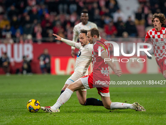 Players are in action during the LaLiga EA Sports 2024-2025 match between Girona FC and Real Valladolid at Montilivi Stadium in Girona, Spai...