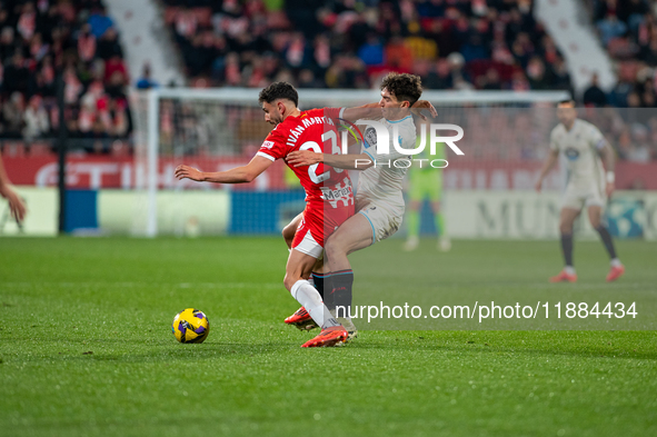 Players are in action during the LaLiga EA Sports 2024-2025 match between Girona FC and Real Valladolid at Montilivi Stadium in Girona, Spai...