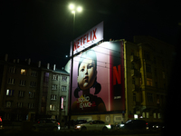 Squid Game 2 Netflix series banner is seen on th building in Warsaw, Poland on December 20, 2024. (