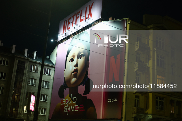 Squid Game 2 Netflix series banner is seen on th building in Warsaw, Poland on December 20, 2024. 