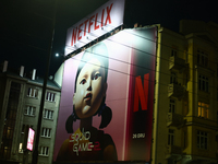 Squid Game 2 Netflix series banner is seen on th building in Warsaw, Poland on December 20, 2024. (