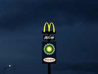 McDonald's, Mccafe, BP and Wild Bean Cafe logos are seen near the restaurant in Poland on December 20, 2024. (