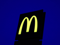 McDonald's logo is seen near the restaurant building in Poland on December 20, 2024. (