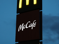 McDonald's, McCafe and McDrive logos are seen near the restaurant in Poland on December 20, 2024. (