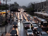 A storm hits the south zone of Sao Paulo in the region of the Joao Dias terminal in Sao Paulo, Brazil, on December 20, 2024, causing traffic...